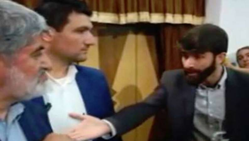 اعتراض به روحانی همراه علی مطهری