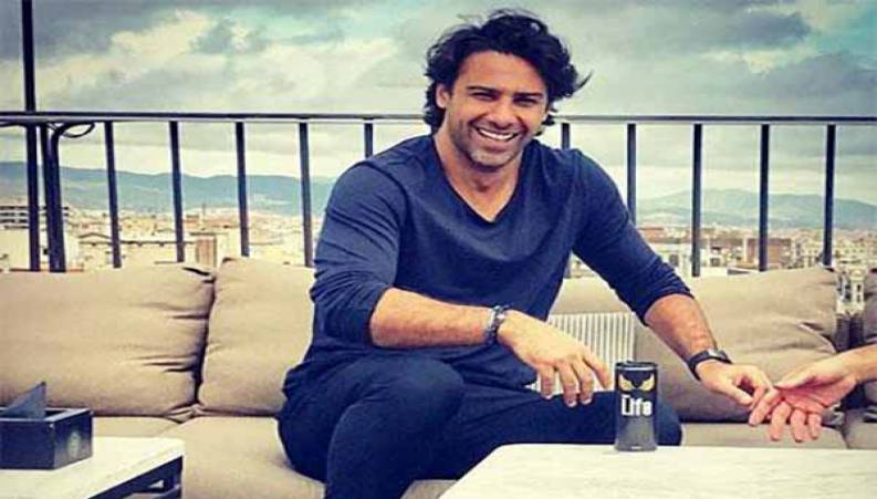 تمرین سخت فرهاد مجیدی با اندام ورزیده با لاستیک تریلی