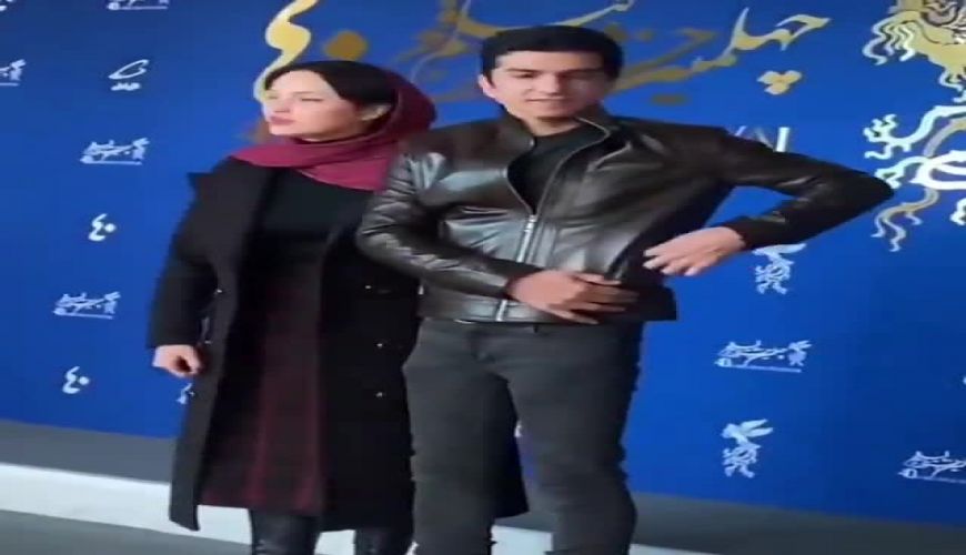 ست لباس قرمز مشکی شیرین اسماعیلی همراه همسرش در جشنواره