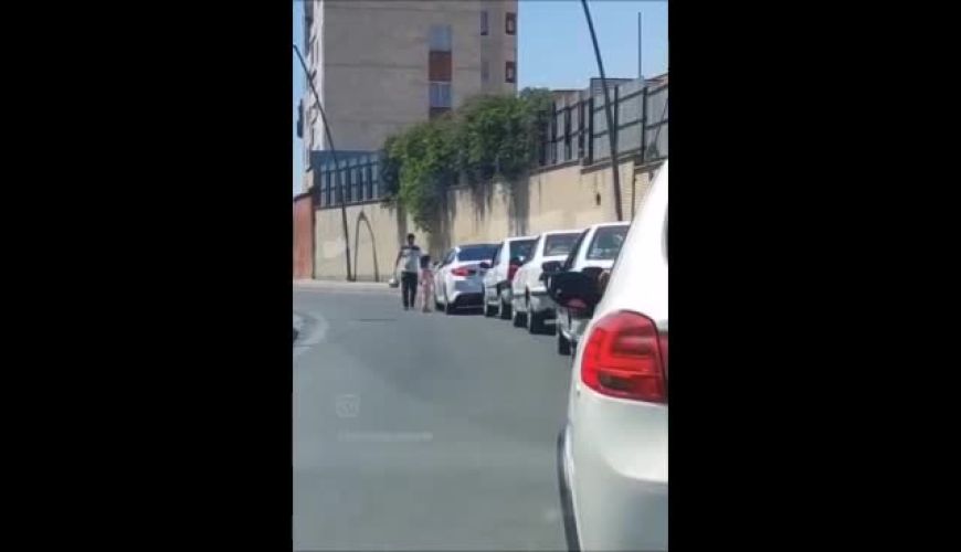 پخش شیرینی توسط یک پدر و دختر زیبایش در صف پمپ بنزین خبرساز شد